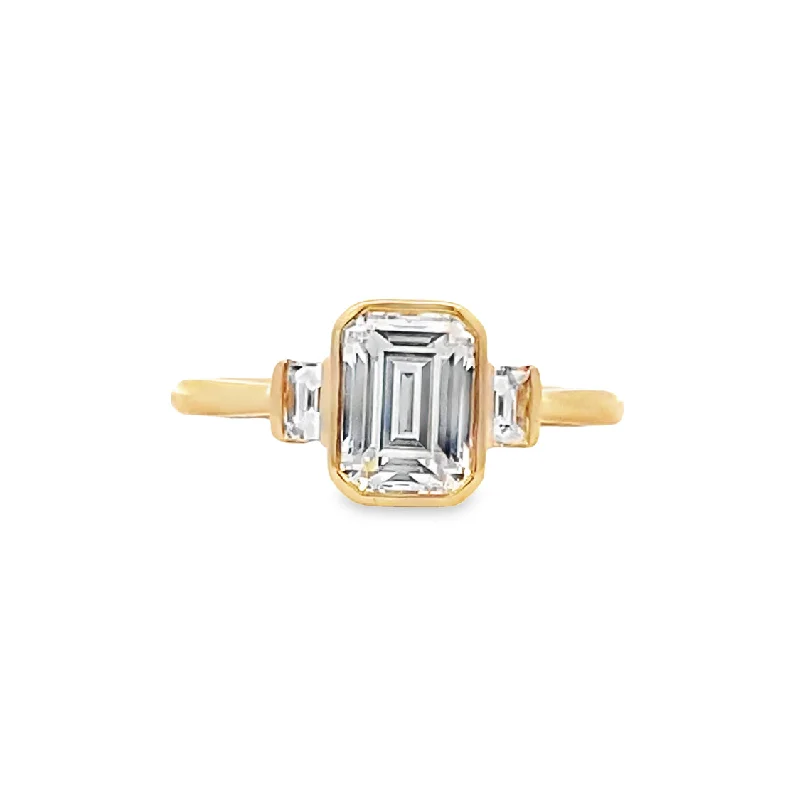 Ladies Flat Edge Engagement Rings -Emerald Cut Diamond Side Stone Engagement Ring in Yellow Gold by Fana