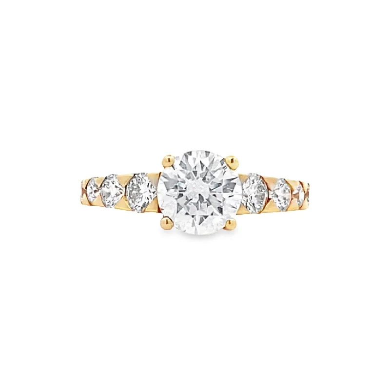 Ladies Yellow Diamond Engagement Rings -Round Diamond Side Stone Engagement Ring in Yellow Gold