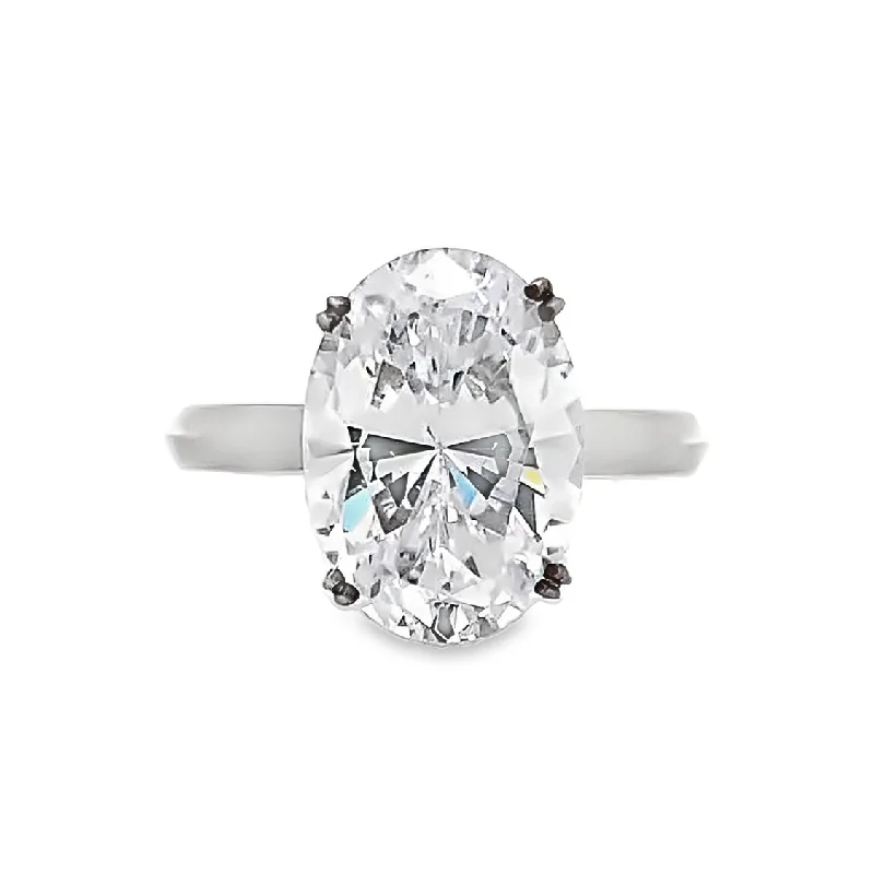 Ladies Flush Gem Engagement Rings -Oval Diamond Solitaire Engagement Ring in White Gold by B&C