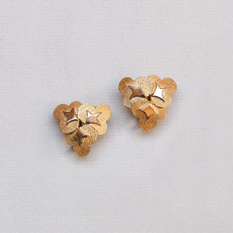 Ladies understated minimal earrings -Vintage Trifari Gold Flower Clip-on Earrings