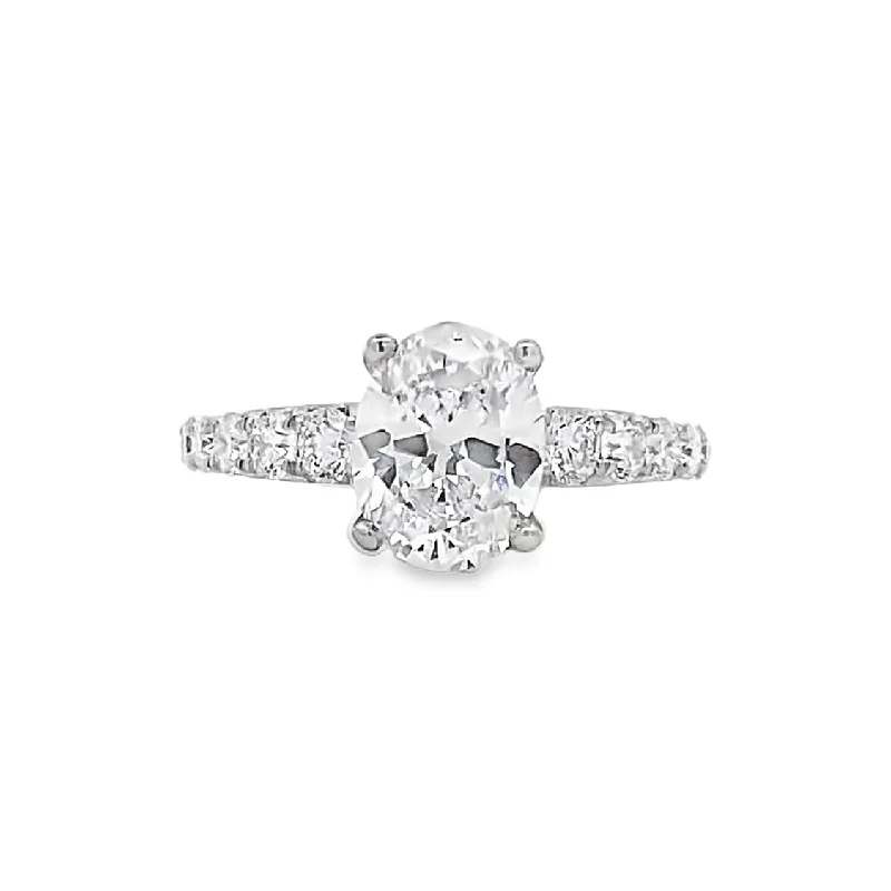 Ladies Halo Shine Engagement Rings -Oval Diamond Side Stone Engagement Ring in White Gold by Simon G