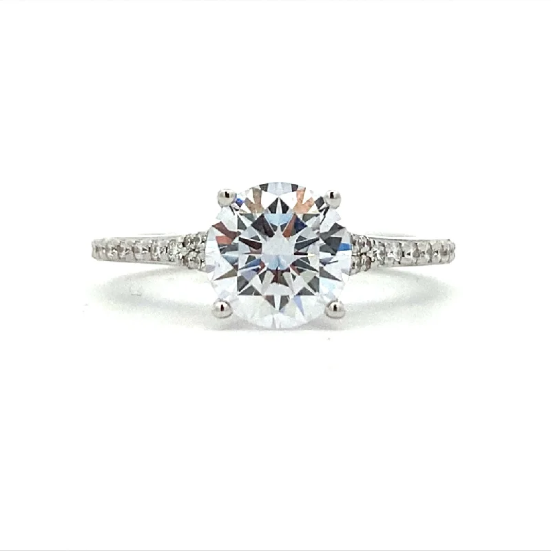 Ladies Elite High-End Engagement Rings -Round Diamond Side Stone Engagement Ring in White Gold by Simon G