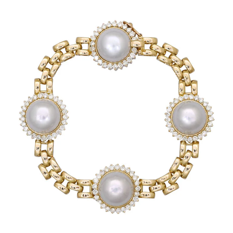 Ladies Bracelets with Coral Kornerupine-Bracelet - South Sea Pearl and Diamond