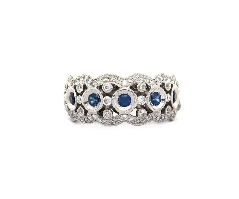 Ladies Rings with Star Glow-0.32ctw Bezel Set Sapphire and 0.50ctw Diamond Wave Band Ring in 18K