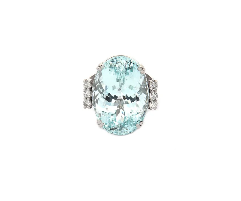 Ladies Rings with Sea Beryl-28.0ct Oval Aquamarine and 0.60ctw Diamond Cocktail Ring in 18K