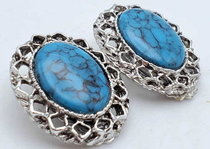 Ladies lone stone earrings -Vintage Faux Turquoise Silver Tone Clip-On Earrings