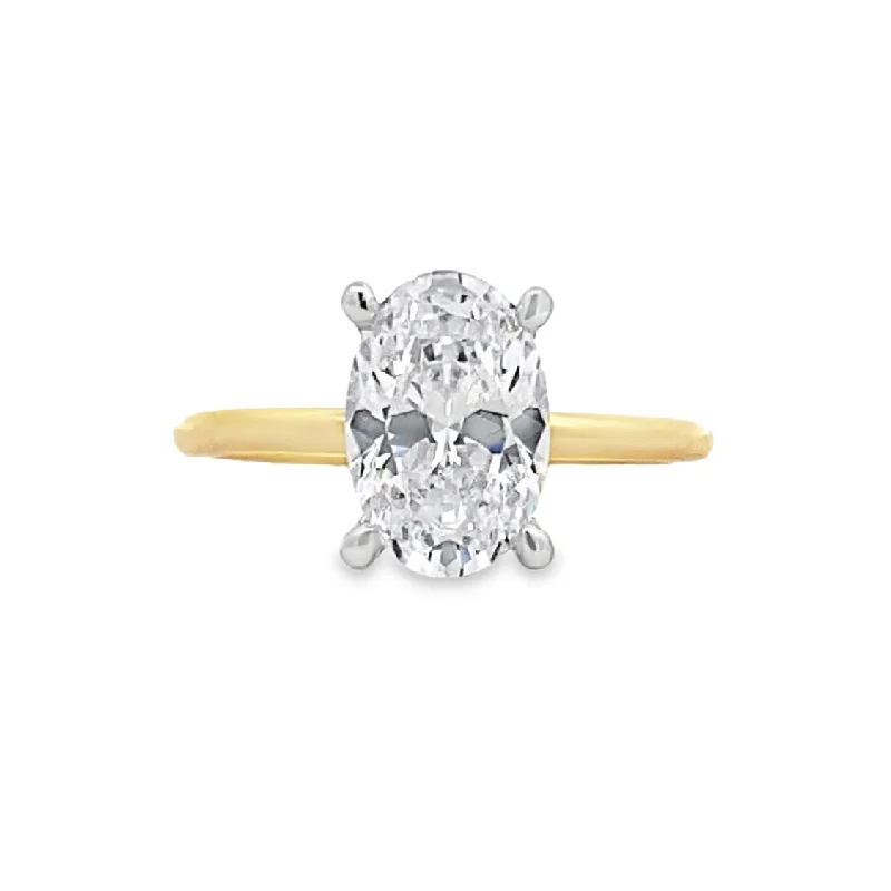 Ladies Polished Platinum Engagement Rings -Oval Diamond Solitaire Engagement Ring in Two-Tone Gold by Gabriel NY