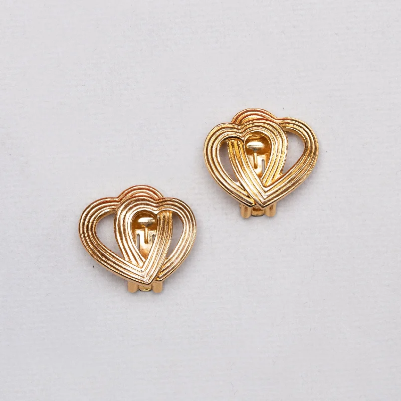 Ladies soft rose gold earrings -Vintage Christian Dior Lined Gold Heart Clip-on Earrings