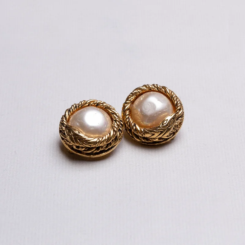 Ladies hushed calm earrings -Vintage Chanel Gold Clip-on Earrings with Pearls